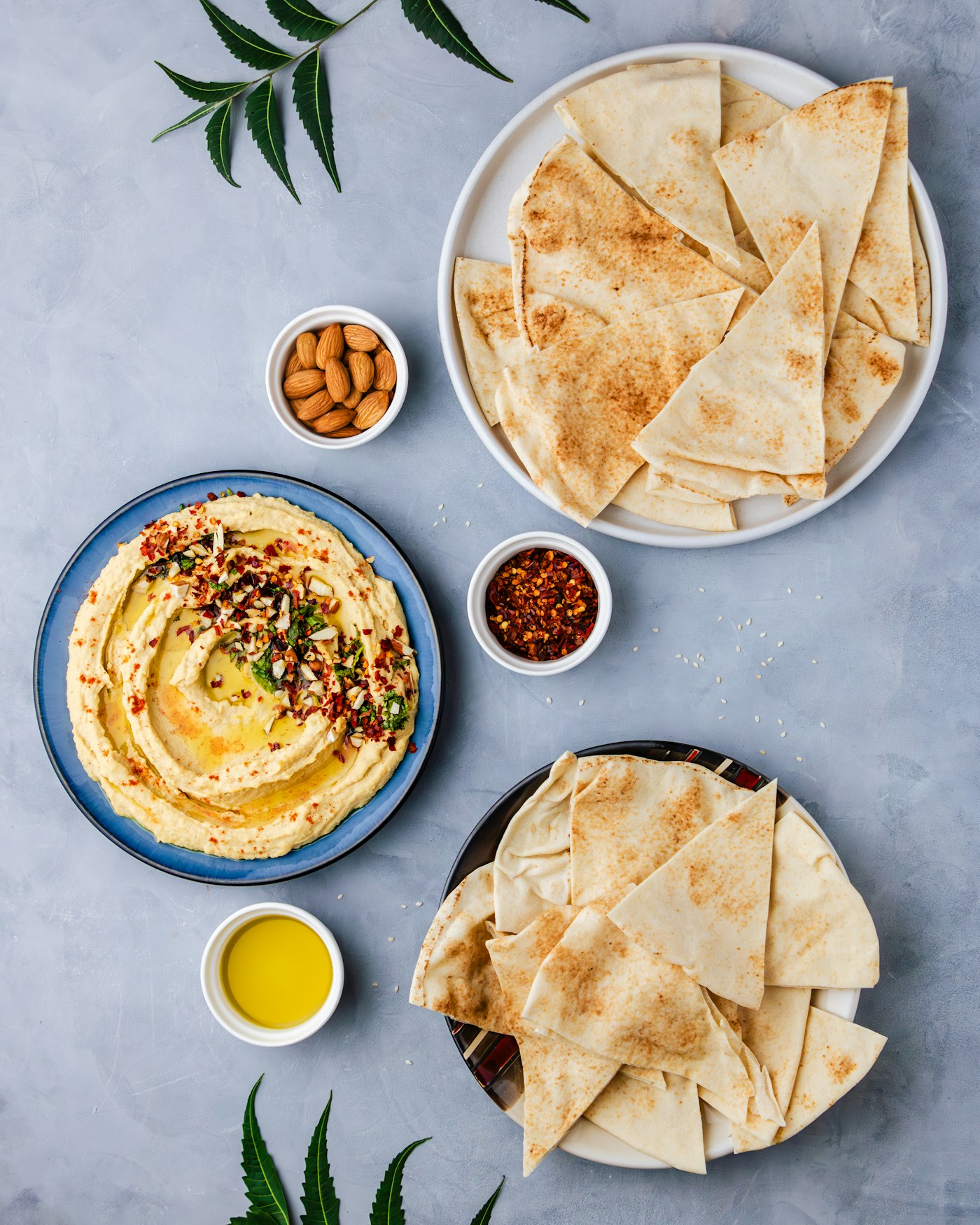Hummus with olive oil, spices, and fresh pita bread